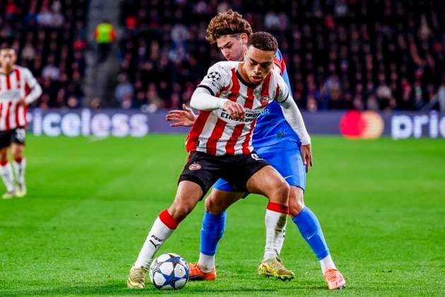 Sergino Dest of PSV Eindhoven and Julian Alvarez of Atletico Madrid battle for the ball PSV Eindhoven v Atletico de Madrid, UEFA Champions League 2025 26 League Phase MD6, PSV Eindhoven v Atletico de Madrid, PSV Stadion, December 9, 2025, Eindhoven, Netherlands.