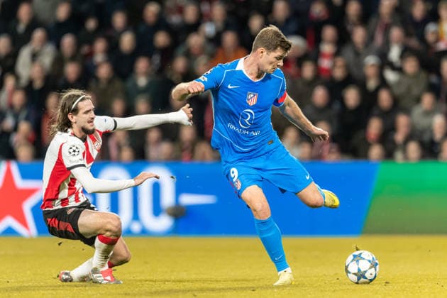 Yarek Gasiorowski PSV Eindhoven and Alexander Sorloth Atletico Madrid battle for the ball during the UEFA Champions League 2025 26 League Phase MD6 match between PSV Eindhoven and Atletico de Madrid at PSV Stadion on December 9, 2025 in Eindhoven, Netherlands