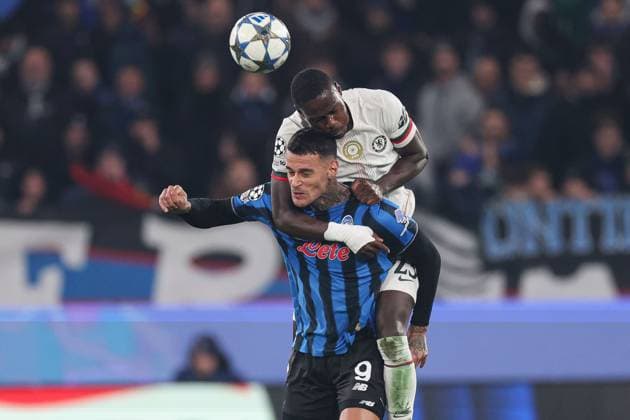 Trevoh Chalobah of Chelsea battles with Gianluca Scamacca of Atalanta BC Atalanta v Chelsea, UEFA Champions League, Group Stage, Football, New Balance Arena, Bergamo, Italy- 09 Dec 2025Bergamo New Balance Arena Italy EDITORIAL USE ONLY No use with unauthorised audio, video, data, fixture lists, club league logos or live services. Online in-match use limited to 120 images, no video emulation. No use in betting, games or single club league player publications. Copyright: xTimxRogers Shutterstockx 16009886am