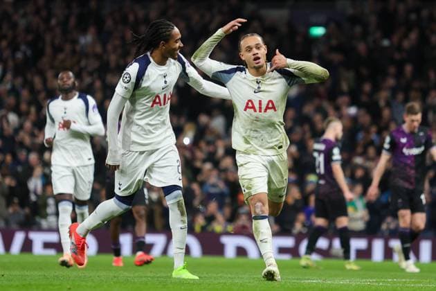 Xavi Simons of Tottenham Hotspur celebrates scoring his team s third goal of the match with teammate Djed Spence Tottenham Hotspur v SK Slavia Praha, Football, UEFA Champions League 2025 26 League Phase MD6, Tottenham Hotspur Stadium, London, UK, 09 12 25 Editorial use only  Copyright: xAnthonyxHanc Shutterstockx 16066670an