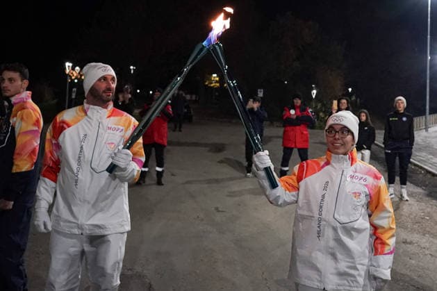 Passage To Perugia Of The Olympic Flame And Ceremony Andrea Giovi, Head Coach of Bartoccini MC Restauri Perugia, receives the Olympic flame of Milan Cortina 2026 during the Passage of the Olympic Torch and Ceremony in Perugia, Italy, on December 9, 2025. Perugia Italy  Copyright: xLorisxCerquiglinix originalFilename:cerquiglini-notitle251209_npcGV.jpg