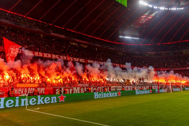 Dortmund, Germany 09 December 2025 Champions League 2025 2026 FC Bayern Munich vs Sporting Lisbon In the picture FCB fans set off pyrotechnics in the south curve Allianz Arena Bayern Copyright: xFotostandx xSchäferx