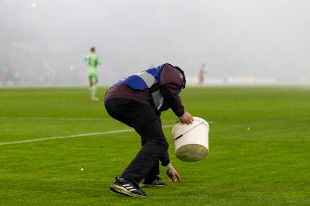 Dortmund, Germany 09 December 2025 Champions League 2025 2026 FC Bayern Munich vs Sporting Lisbon In the picture security forces remove remains of pyrotechnics Allianz Arena Bayern Copyright: xFotostandx xSchäferx