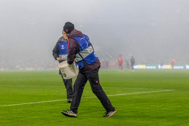 Dortmund, Germany 09 December 2025 Champions League 2025 2026 FC Bayern Munich vs Sporting Lisbon In the picture Security forces remove remains of pyrotechnics on the pitch Allianz Arena Bayern Copyright: xFotostandx xSchäferx