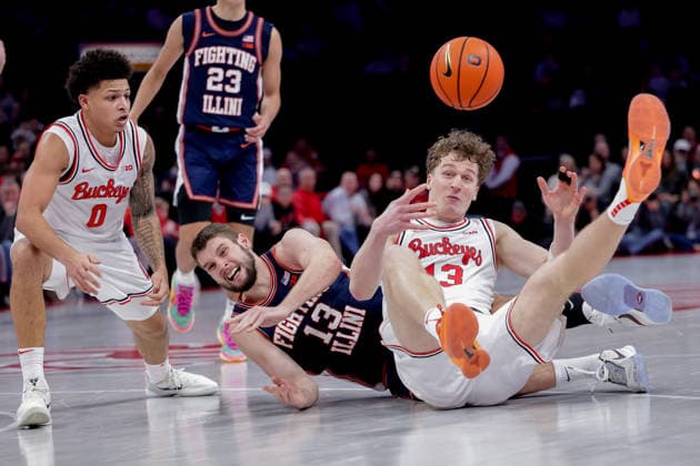 December 9, 2025, Columbus, Ohio, U.S: Illinois Fighting Illini center Tomislav Ivisic (13) and Ohio State Buckeyes center Christoph Tilly (13) go after a loose ball during the game between the Illinois Fighting Illini and the Ohio State Buckeyes at Value City Arena, Columbus, Ohio. Columbus U.S - ZUMAs304 20251209_zaf_s304_004 Copyright: xScottxStuartx
