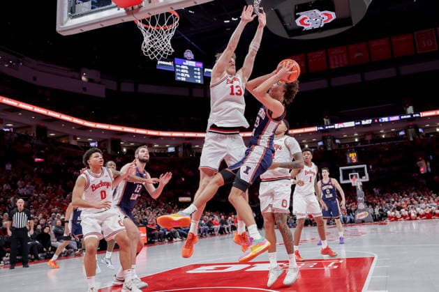 December 9, 2025, Columbus, Ohio, U.S: Ohio State Buckeyes center Christoph Tilly (13) goes up to try to block a shot under the basket by Illinois Fighting Illini guard Keaton Wagler (23) during the game between the Illinois Fighting Illini and the Ohio State Buckeyes at Value City Arena, Columbus, Ohio. Columbus U.S - ZUMAs304 20251209_zaf_s304_007 Copyright: xScottxStuartx