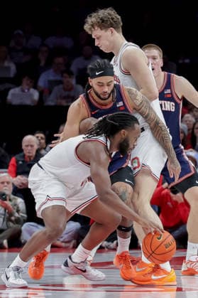 December 9, 2025, Columbus, Ohio, U.S: Ohio State Buckeyes guard Bruce Thornton (2) drives Illinois Fighting Illini guard Kylan Boswell (4) into a screen set by Ohio State Buckeyes center Christoph Tilly (13) during the game between the Illinois Fighting Illini and the Ohio State Buckeyes at Value City Arena, Columbus, Ohio. Columbus U.S - ZUMAs304 20251209_zaf_s304_026 Copyright: xScottxStuartx