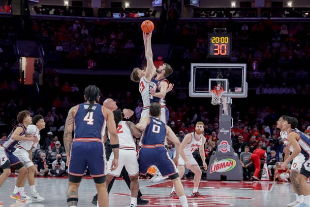 December 9, 2025, Columbus, Ohio, U.S: Ohio State Buckeyes center Christoph Tilly (13) and Illinois Fighting Illini center Tomislav Ivisic (13) jump at the tip off of the game between the Illinois Fighting Illini and the Ohio State Buckeyes at Value City Arena, Columbus, Ohio. Columbus U.S - ZUMAs304 20251209_zaf_s304_044 Copyright: xScottxStuartx
