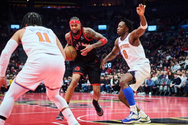 December 9, 2025, Toronto, On, Canada: Toronto Raptors Brandon Ingram (3) drives through New York Knicks OG Anunoby (8) and Jalen Brunson (11) during first half NBA, Basketball Herren, USA Cup basketball action in Toronto, on Tuesday, Dec. 9, 2025. Canada News - December 9, 2025 - ZUMAc35_ 20251209_zaf_c35_103 Copyright: xSammyxKoganx