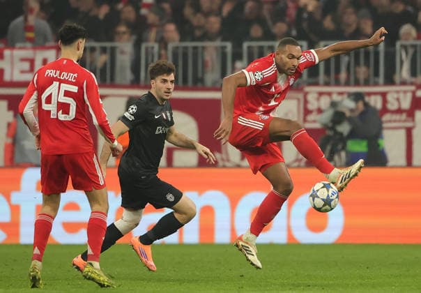 (251210) -- MUNICH, Dec. 10, 2025 -- Jonathan Tah (R) of Bayern Munich vies with Georgios Vagiannidis (C) of Sporting CP during the UEFA Champions League football match between Bayern Munich and Sporting CP in Munich, Germany, Dec. 9, 2025. (Photo by Xinhua) (SP)GERMANY-MUNICH-FOOTBALL-UEFA CHAMPIONS LEAGUE-BAYERN MUNICH VS SPORTING CP PhilippexRuiz 