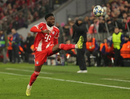 (251210) -- MUNICH, Dec. 10, 2025 -- Alphonso Davies of Bayern Munich controls the ball during the UEFA Champions League football match between Bayern Munich and Sporting CP in Munich, Germany, Dec. 9, 2025. (Photo by Xinhua) (SP)GERMANY-MUNICH-FOOTBALL-UEFA CHAMPIONS LEAGUE-BAYERN MUNICH VS SPORTING CP PhilippexRuiz 