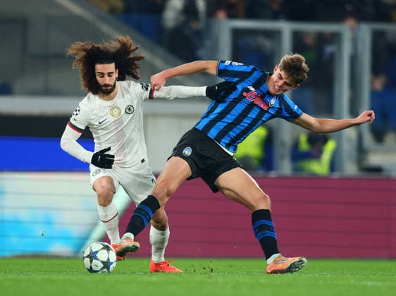 (251210) -- BERGAMO, Dec. 10, 2025 () -- Chelsea s Marc Cucurella (L) vies with Atalanta s Charles De Katelaere during the UEFA Champions League match between Atalanta and Chelsea in Bergamo, Italy, Dec. 9, 2025. () (SP)ITALY-BERGAMO-FOOTBALL-UEFA CHAMPIONS LEAGUE-ATALANTA VS CHELSEA Xinhua 
