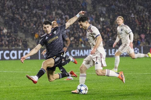 BAKU , 10-12-2025 , Tofiq Bahramov Stadion , Season 2025 2026 , UEFA Champions League football , match between FK Qarabag and Ajax Amsterdam , picture shows Qarabag FK player Bahlul Mustafazade and Ajax player Raul Moro Qarabag - Ajax  x200102997x Copyright: