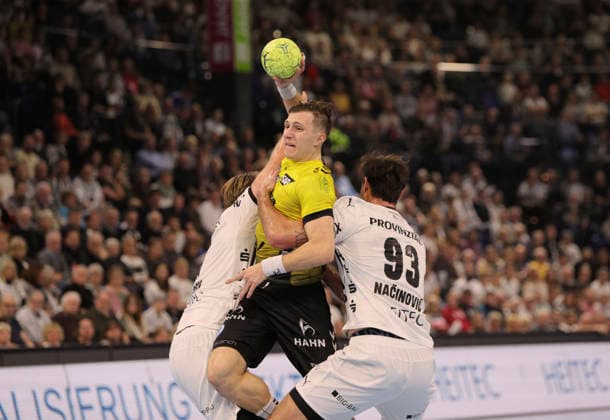 Photo Goal throw from Simone MENGON Stuttgart against Petter Overby Kiel and on the right Veron Nacinovic Kiel , 93 Handball Men 1 Bundesliga on Wed 10 12 2025 THW Kiel TVB Stuttgart