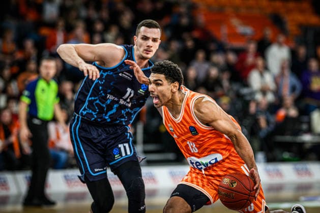 Marko Simonovic Turk Telekom Ankara and Mark Smith ratiopharm ulm battle for the ball during the Basketball Eurocup match between ratiopharm ulm and Turk Telekom Ankara at ratiopharm Arena on December 10, 2025 in Neu Ulm, Germany Photo by Harry Langer DeFodi Images