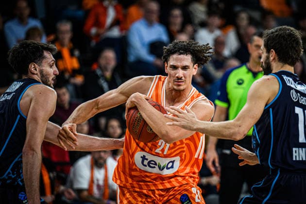 Berkan Durmaz Turk Telekom Ankara , Alec Anigbata ratiopharm ulm and Dogus Ozdemiroglu Turk Telekom Ankara battle for the ball during the Basketball Eurocup match between ratiopharm ulm and Turk Telekom Ankara at ratiopharm Arena on December 10, 2025 in Neu Ulm, Germany Photo by Harry Langer DeFodi Images