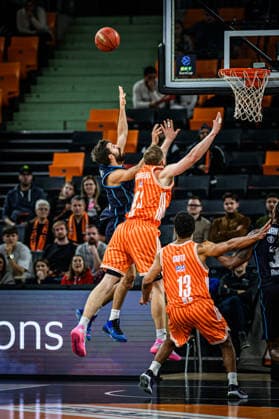 Dogus Ozdemiroglu Turk Telekom Ankara , Christian Sengfelder ratiopharm ulm and Mark Smith ratiopharm ulm battle for the ball during the Basketball Eurocup match between ratiopharm ulm and Turk Telekom Ankara at ratiopharm Arena on December 10, 2025 in Neu Ulm, Germany Photo by Harry Langer DeFodi Images