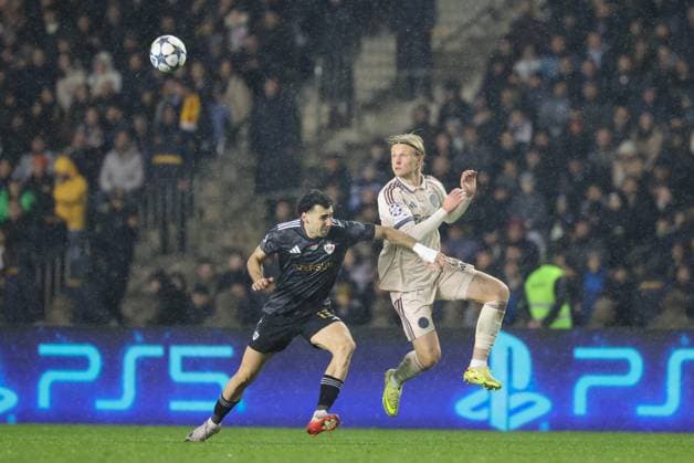 BAKU , 10-12-2025 , Tofiq Bahramov Stadion , Season 2025 2026 , UEFA Champions League football , match between FK Qarabag and Ajax Amsterdam , picture shows Qarabag FK player Leandro Andrade and Ajax player Kasper Dolberg Qarabag - Ajax  x200103960x Copyright: