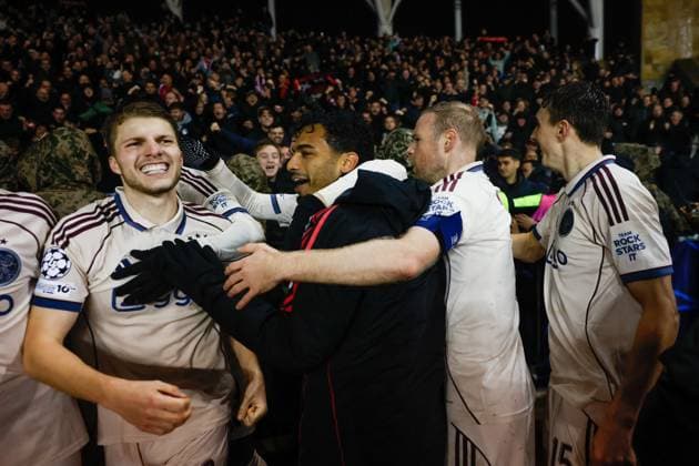 BAKU , 10-12-2025 , Tofiq Bahramov Stadion , Season 2025 2026 , UEFA Champions League football , match between FK Qarabag and Ajax Amsterdam , picture shows goal celebration by Ajax player Anton Gaaei , Ajax player Owen Wijndal , Ajax player Davy Klaassen Qarabag - Ajax  x200104334x Copyright:
