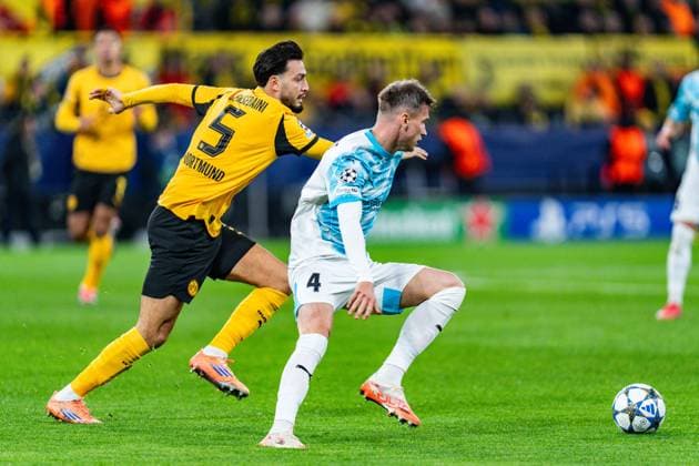 10 12 2025, Borussia Dortmund vs FK Bodo Glimt, UEFA Champions League, Matchday 6 Ramy Bensebaini Borussia Dortmund, 5 Odin Luras Bjortuft FK Bodo Glimt 4 Regulations prohibit any use of photographs as image sequences and or quasi video Copyright: xBahhoxKarax
