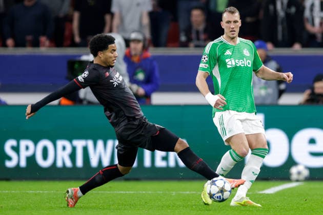 2025-12-10 Bayer 04 Leverkusen v Newcastle United FC - UEFA Champions League 2025 26 League Phase MD6 LEVERKUSEN, GERMANY - DECEMBER 10: Malik Tillman of Bayer 04 Leverkusen battles for the ball with Dan Burn of Newcastle United FC during the UEFA Champions League 2025 26 League Phase MD6 match between Bayer 04 Leverkusen and Newcastle United FC at BayArena on December 10, 2025 in Leverkusen, Germany. Leverkusen BayArena Germany Content not available for redistribution in The Netherlands directly or indirectly through any third parties. Copyright: xJorisxVerwijstx