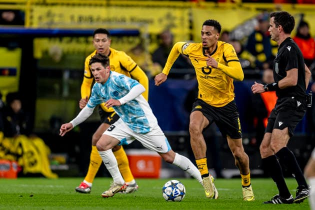 Bodo Glimt forwarder Kasper Hogh, Borussia Dortmund midfielder Felix Nmecha, during the match Borussia Dortmund vs FK Bodo Glimt at the BVB Stadion Dortmund for the Champions League phase Matchday 6 season 2025 2026 in DORTMUND, Germany on 10 December 2025, photo by Stefan Koops EYE4images DeFodi Images