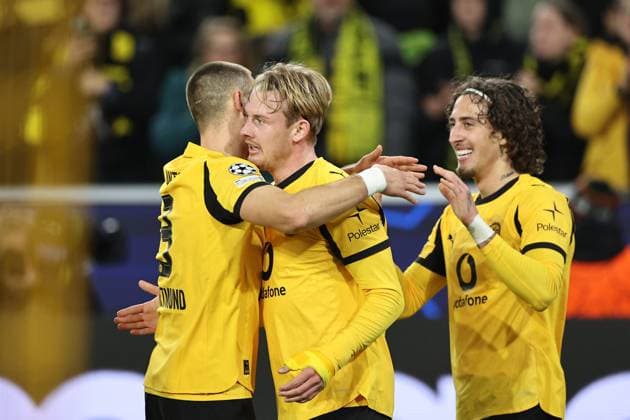 DORTMUND - (l-r) Waldemar Anton of Borussia Dortmund, Julian Brandt of Borussia Dortmund, and Fabio Sliva of Borussia Dortmund celebrate 1-0 during the Champions League match between Borussia Dortmund and FK Bodo Glimt at Signal Iduna Park on December 10, 2025, in Dortmund, Germany. ANP Hollandse Hoogte Bart Stoutjesdijk UEFA Champions League 2025 26 xVIxANPxSportx xBartxStoutjesdijkxIVx 544518970 originalFilename: 544518970.jpg