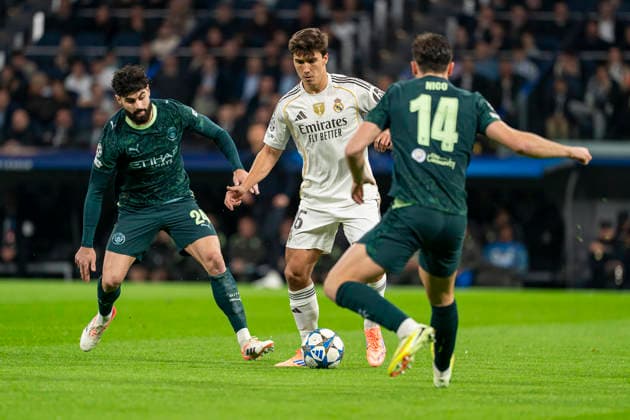 REAL MADRID CF v MANCHESTER CITY FC. CHAMPIONS LEAGUE 2025 2026. ROUND 6. Real Madrid CF s Gonzalo Garcia (R) and Manchester City FC s Josko Guardiol during Champions League 2025 2026 match. December 10,2025. (ALTERPHOTOS Ropero) MadridSpain  Copyright: xRoperox