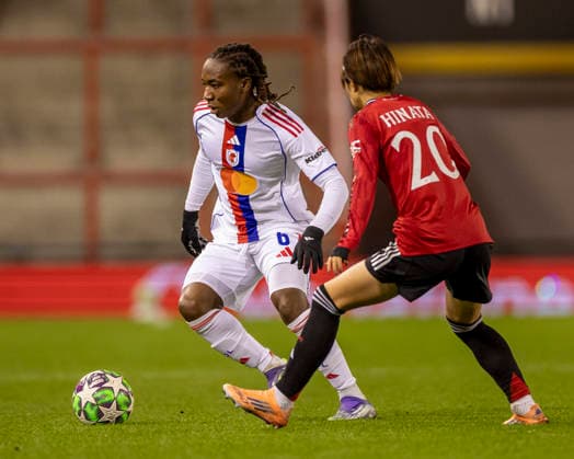 10th December 2025; Leigh Sports Village, Manchester, England; Womens Champions League Football, Manchester United, ManU versus Lyon Women; Melchie Dumornay of OL Lyonnes under pressure from Hinata Miyazawa of Manchester United Women  TimxWilliams