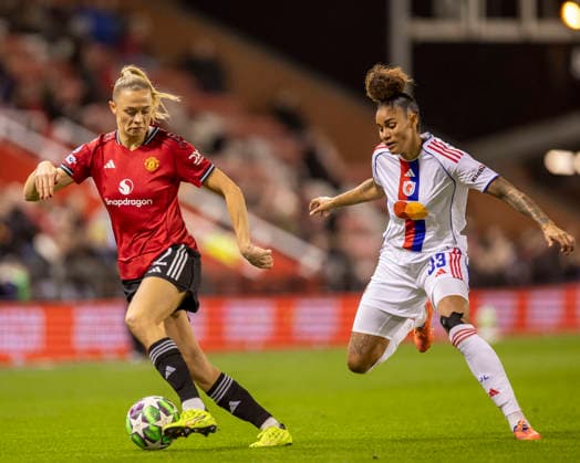 10th December 2025; Leigh Sports Village, Manchester, England; Womens Champions League Football, Manchester United, ManU versus Lyon Women; Fridolina Rolfo of Manchester United Women under pressure from Tarciane of OL Lyonnes  TimxWilliams