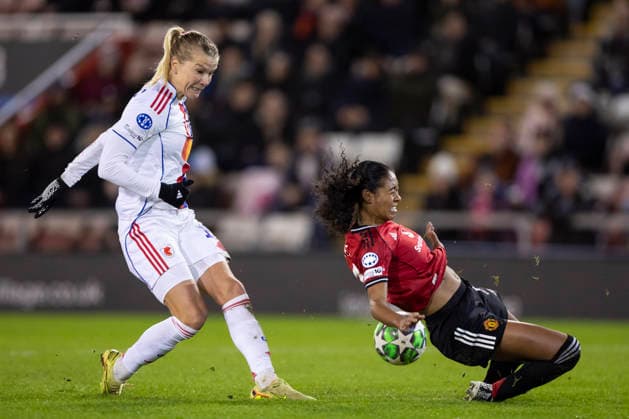 10th December 2025; Leigh Sports Village, Manchester, England; Womens Champions League Football, Manchester United, ManU versus Lyon Women; Ada Hegerberg of OL Lyonnes takes a shot on goal as Jayde Riviere of Manchester United Women defends  TimxWilliams