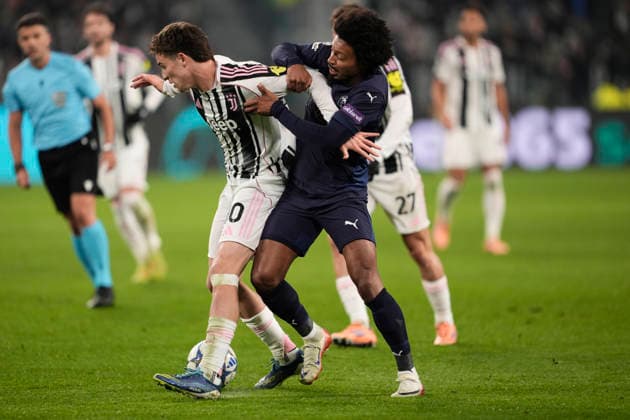 Juventus™s Kenan Yildiz fights for the ball with Pafos™ Bruno Felipe during the Uefa Champions League soccer match, between Juventus and Pafos at the Allianz Stadium in Turin, League phase Matchday 6, north west Italy - December 10, 2025. - Soccer  Copyright: xFabioxFerrari LaPressex