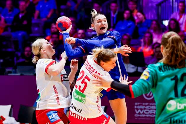 Lena Grandveau of France and Michala Elsberg Moller of Denmark and Trine Ostergaard Jensen of Denmark fight for the ball Denmark v France, Quarter finals - 27th IHF Women s Handball World Championship, WM, Weltmeisterschaft Denmark v France, Ahoy, December 10, 2025, Rotterdam, Netherlands.