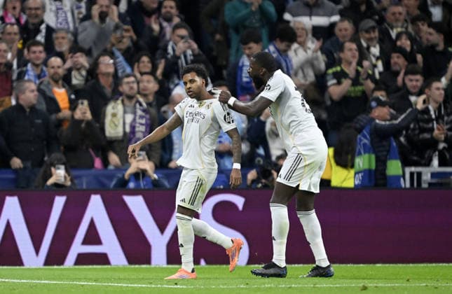 Real Madrid v Manchester City - UEFA Champions League MADRID, SPAIN - DECEMBER 10: Real Madrid’s Rodrygo Goes (L) celebrates his goal with teammate Antonio Rudiger (R) during the UEFA Champions League Matchday 6 game against Manchester City at Bernabeu Stadium in Madrid, Spain, on December 10, 2025. Burak Akbulut Anadolu Madrid Spain. Editorial use only. Please get in touch for any other usage.  Copyright: x2025xAnadoluxBurakxAkbulutx