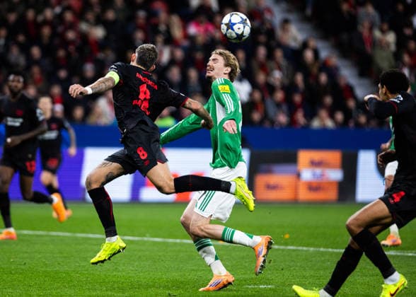 Leverkusen, Bayarena, 10 12 2025 Robert Andrich of Leverkusen challenges Nick Woltemade of Newcastle during the Championsleague match Bayer 04 Leverkusen v Newcastle United