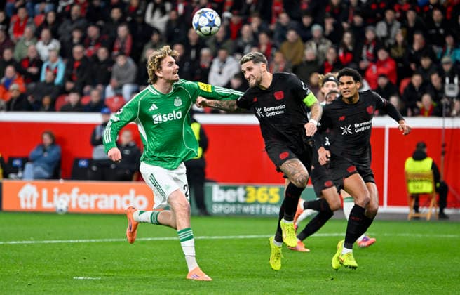 BayArena Leverkusen, 10 12 2025, Soccer Champions League Season 2025 26 6 Matchday, Bayer 04 Leverkusen B04, black vs Newcastle United NEW, green Nick Woltemade NEW , Robert Andrich B04 UEFA REGULATIONS PROHIBIT ANY USE OF PHOTOGRAPHS AS IMAGE SEQUENCES AND OR QUASI VIDEO