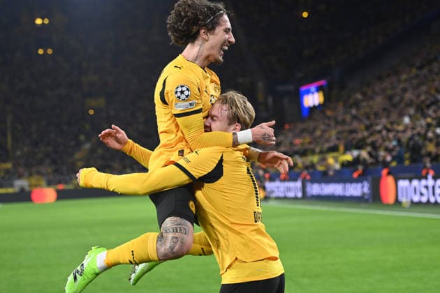 Julian BRANDT DO cheers after his goal for 1 0, cheers, jubilation, joy, cheers, with FABIO SILVA DO Football UEFA Champions League group stage 6 matchday, matchday6, Borussia Dortmund DO FK Bodoe Glimt on 10 12 2025 in Dortmund Germany UEFA regulations prohibit any use of photographs as image sequences and or quasi video Â