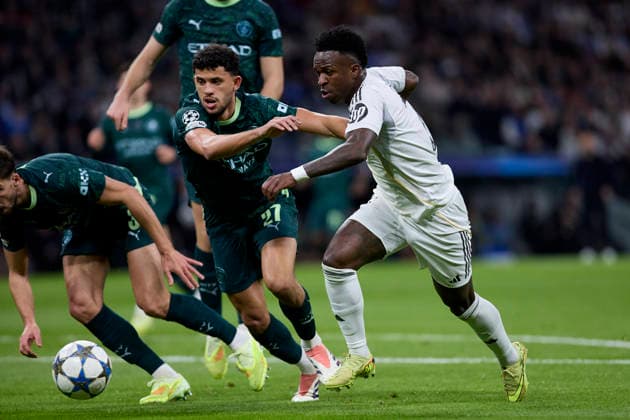 December 10, 2025, Madrid, Madrid, Spain: Vinicius Jr of Real Madrid CF and Matheus Nunes of Manchester City FC during the UEFA Champions League football match between Real Madrid CF and Manchester City FC at Santiago Bernabeu Stadium in Madrid, Spain, december 10, 2025 Madrid Spain - ZUMAa206 20251210_zsp_a206_018 Copyright: xRubenxAlbarranx