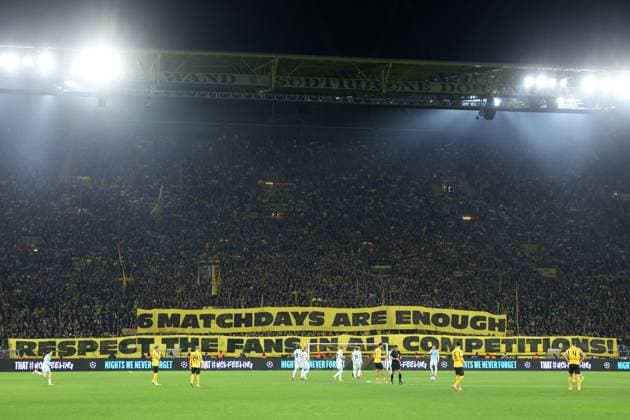 DORTMUND - Dortmund fans hold a banner during the Champions League match between Borussia Dortmund and FK Bodo Glimt at Signal Iduna Park on December 10, 2025, in Dortmund, Germany. ANP Hollandse Hoogte Bart Stoutjesdijk UEFA Champions League 2025 26 xVIxANPxSportx xBartxStoutjesdijkxIVx 544523456 originalFilename: 544523456.jpg