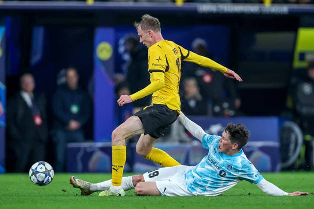 10 12 2025, Football, UEFA Champions League, Borussia Dortmund FK Bodö Glimt, BVB Stadion, Matchday 5, Season 2025 2026 Maximilian Beier BVB 14 in duel against Sondre Brunstad Fet Bodo Glimt 19 Regulations prohibit any use of photographs as image sequences and or quasi video North Rhine-Westphalia Germany