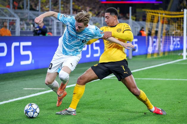 10 12 2025, Football, UEFA Champions League, Borussia Dortmund FK Bodö Glimt, BVB Stadion, Matchday 5, Season 2025 2026 Jens Petter Hauge Bodo Glimt 10 in duel against Jobe Bellingham BVB 07 Regulations prohibit any use of photographs as image sequences and or quasi video Nordrhein Westfalen Germany