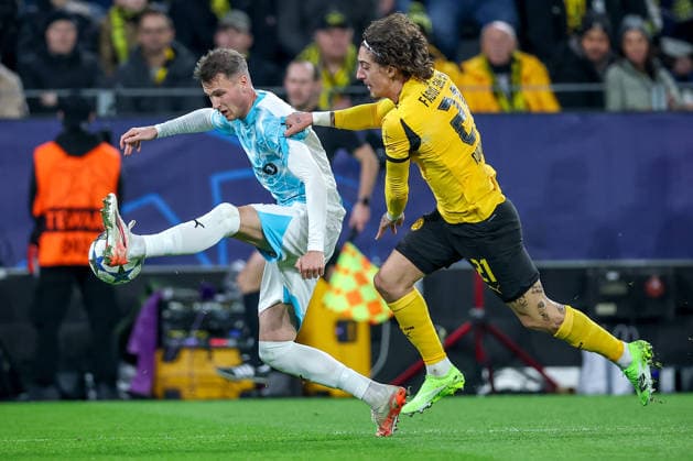 10 12 2025, Football, UEFA Champions League, Borussia Dortmund FK Bodö Glimt, BVB Stadion, Matchday 5, Season 2025 2026 Odin Bjortuft Bodo Glimt 04 in a duel against Fabio Silva BVB 21 Regulations prohibit any use of photographs as image sequences and or quasi video North Rhine-Westphalia Germany