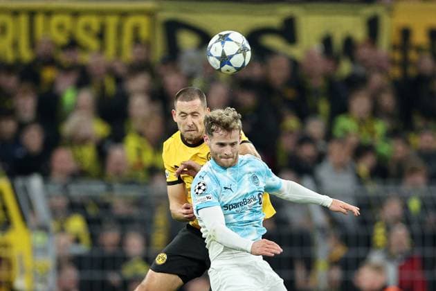 DORTMUND - (l-r) Waldemar Anton of Borussia Dortmund, Ole Didrik Blomberg of Bodo Glimt during the Champions League match between Borussia Dortmund and FK Bodo Glimt at Signal Iduna Park on December 10, 2025, in Dortmund, Germany. ANP Hollandse Hoogte Bart Stoutjesdijk UEFA Champions League 2025 26 xVIxANPxSportx xBartxStoutjesdijkxIVx 544523857 originalFilename: 544523857.jpg
