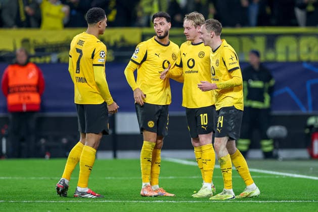 10 12 2025, Football, UEFA Champions League, Borussia Dortmund FK Bodö Glimt, BVB Stadion, Matchday 5, Season 2025 2026 Goal celebration after the goal to 2 1 by scorer Julian Brandt BVB 10 together with Jobe Bellingham BVB 07 Ramy Bensebaini BVB 05 Maximilian Beier BVB 14 Regulations prohibit any use of photographs as image sequences and or quasi video Nordrhein Westfalen Germany