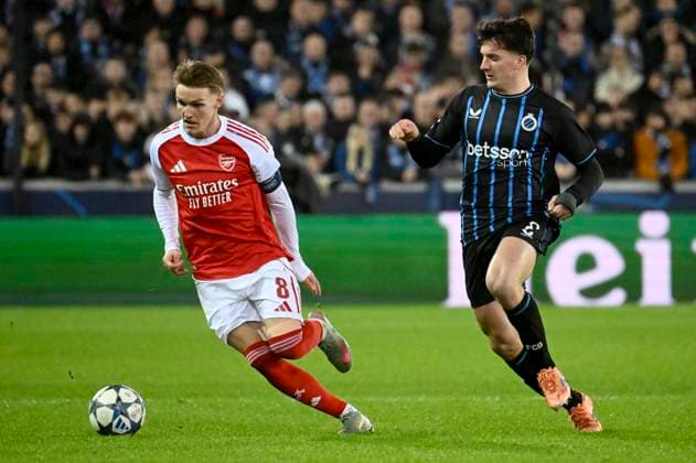 Club Brugge v Arsenal - UEFA Champions League BRUGGE, BELGIUM - DECEMBER 10 : Odegaard Martin midfielder of Arsenal and Tzolis Christos forward of Club Brugge during the UEFA Champions League 2025 26 League Phase MD6 match between Club Brugge and Arsenal on December 10, 2025 in Brugge, Belgium, 10 12 2025 Brugge Belgium  Copyright: xPeterxDexVoechtx
