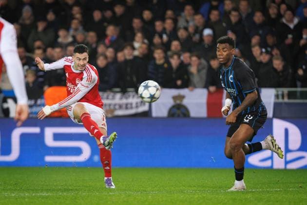 Arsenal s Gabriel Martinelli and Club s Raphael Onyedika fight for the ball during a soccer game between Belgian soccer team Club Brugge KV and English Arsenal F.C, on Wednesday 10 December 2025 in Brugge, on day 6 (out of 8) of the League phase of the UEFA Champions League tournament. KURTxDESPLENTER  x148029623x