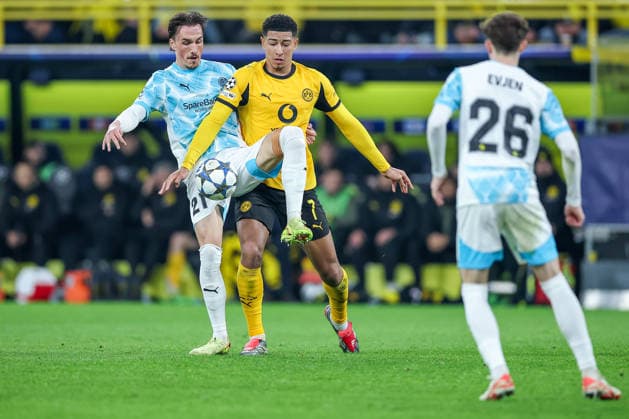 10 12 2025, Football, UEFA Champions League, Borussia Dortmund FK Bodö Glimt, BVB Stadion, Matchday 5, Season 2025 2026 Andreas Helmersen Bodo Glimt 21 in duel against Jobe Bellingham BVB 07 Regulations prohibit any use of photographs as image sequences and or quasi video North Rhine-Westphalia Germany