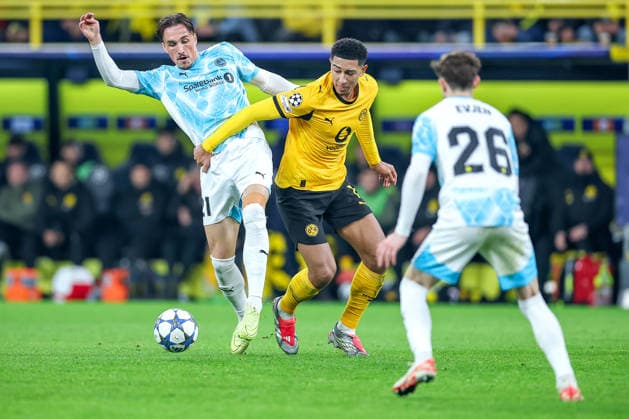 10 12 2025, Football, UEFA Champions League, Borussia Dortmund FK Bodö Glimt, BVB Stadion, Matchday 5, Season 2025 2026 Andreas Helmersen Bodo Glimt 21 in duel against Jobe Bellingham BVB 07 Regulations prohibit any use of photographs as image sequences and or quasi video North Rhine-Westphalia Germany