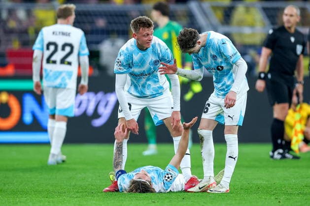10 12 2025, Football, UEFA Champions League, Borussia Dortmund FK Bodö Glimt, BVB Stadion, Matchday 5, Season 2025 2026 Happy and relieved ag30 and Hakon Evjen Bodo Glimt 26 stand next to Patrick Berg Bodo Glimt 07 after the 2 2 final score on the pitch joy final celebration Regulations prohibit any use of photographs as image sequences and or quasi video North Rhine-Westphalia Germany