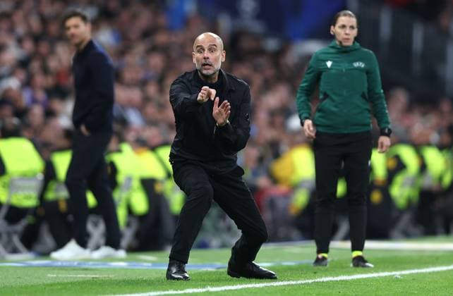 Manchester City manager Pep Guardiola gestures on the touchline Real Madrid v Manchester City, UEFA Champions League, Group Stage, Football, Bernabeu, Madrid, Spain - 10 Dec 2025Madrid Bernabeu Spain EDITORIAL USE ONLY No use with unauthorised audio, video, data, fixture lists, club league logos or live services. Online in-match use limited to 120 images, no video emulation. No use in betting, games or single club league player publications. Copyright: xKieranxMcManus Shutterstockx 16009961bq